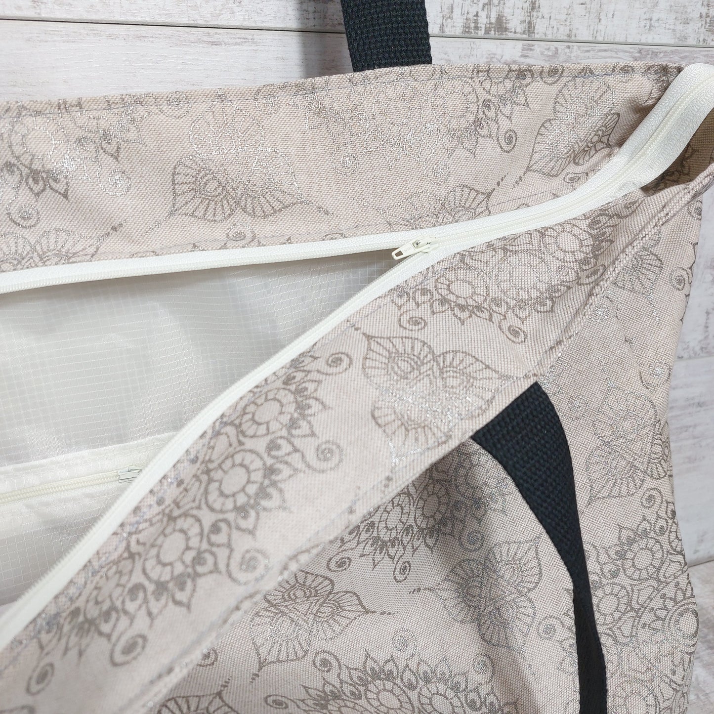 Multi pocket lined beach bag with secure zip fastening along the top. LAST ONE!