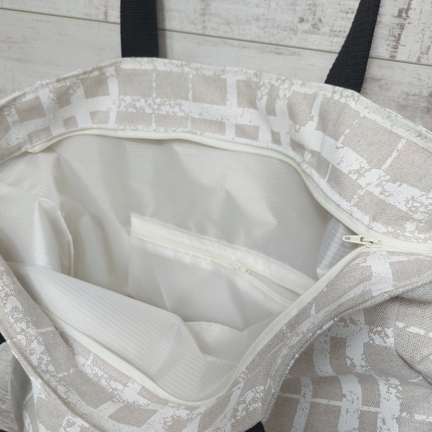 Roomy Beach Bag with zip fastening and Neutral Aesthetic in natural colours.