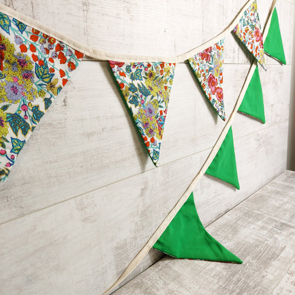 Green floral bunting by Olganna.