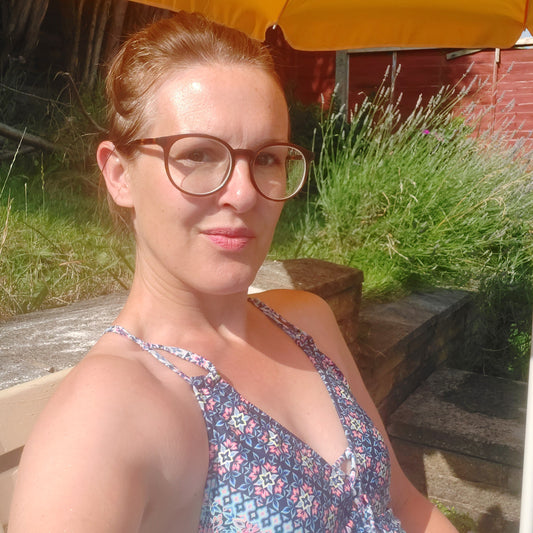 Wearing glasses in sunshine.