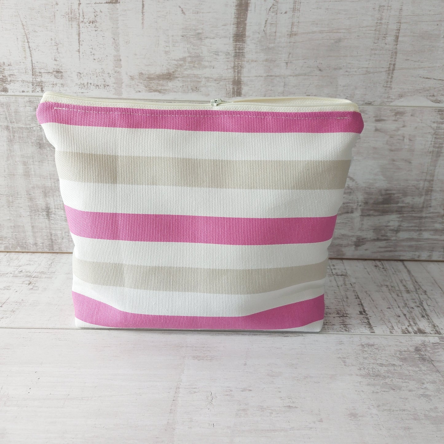 Striped Travel Pouch with Wipe Clean Lining and Zip Fastening
