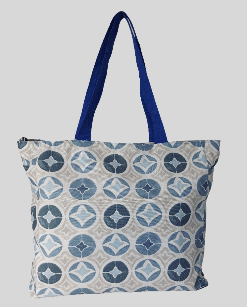 Front view of blue Moroccan tile print beach bag.