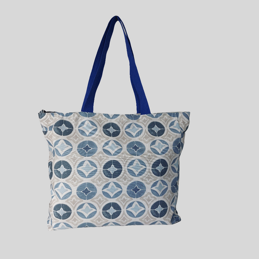 Front view of blue Moroccan tile print beach bag.