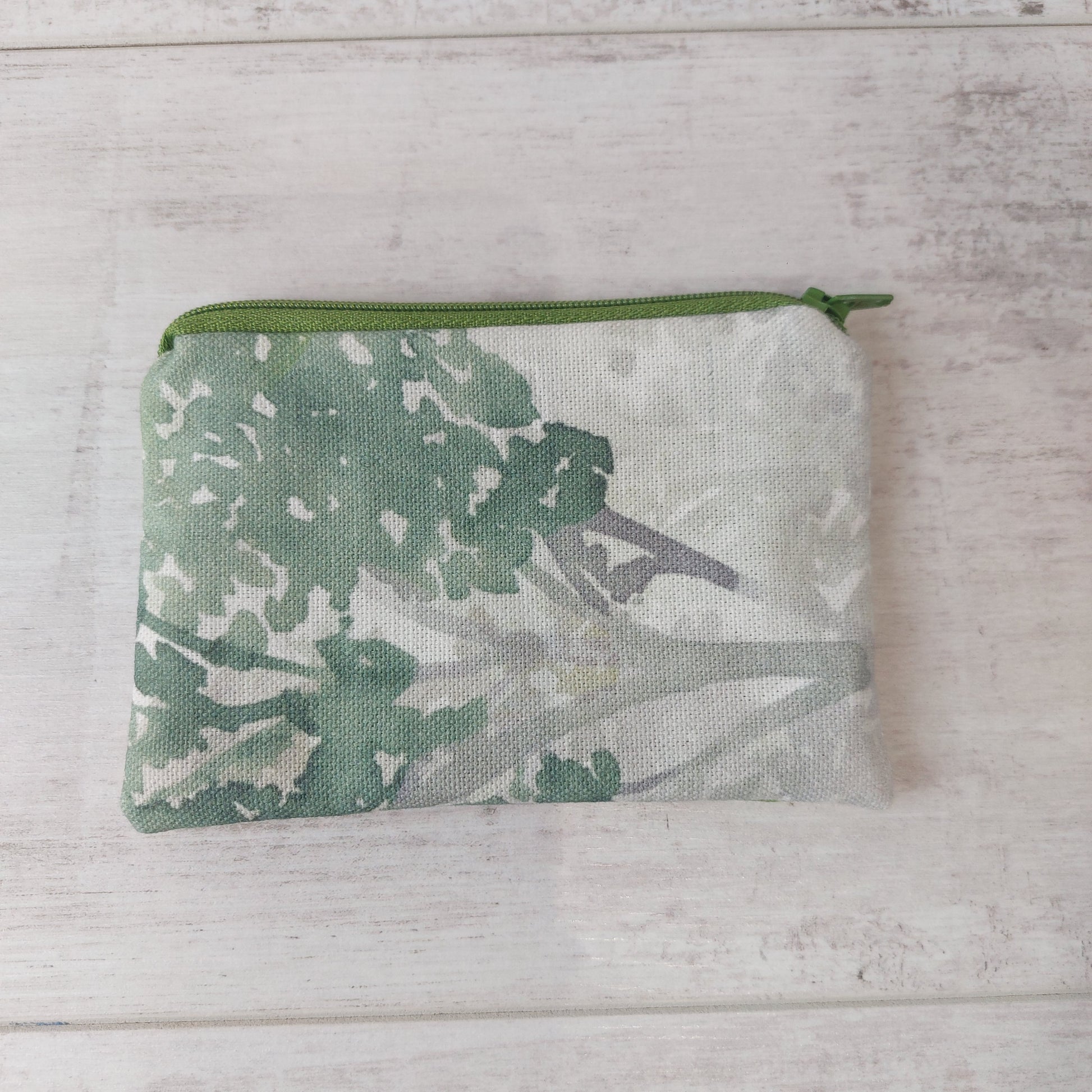 Green tree print zip purse by Olganna.