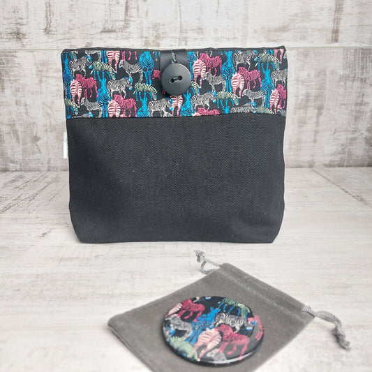 Black button pouch with colourful zebra print top and zebra print compact mirror with pouch.