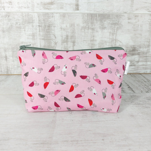Front view of pink mice print makeup bag. 