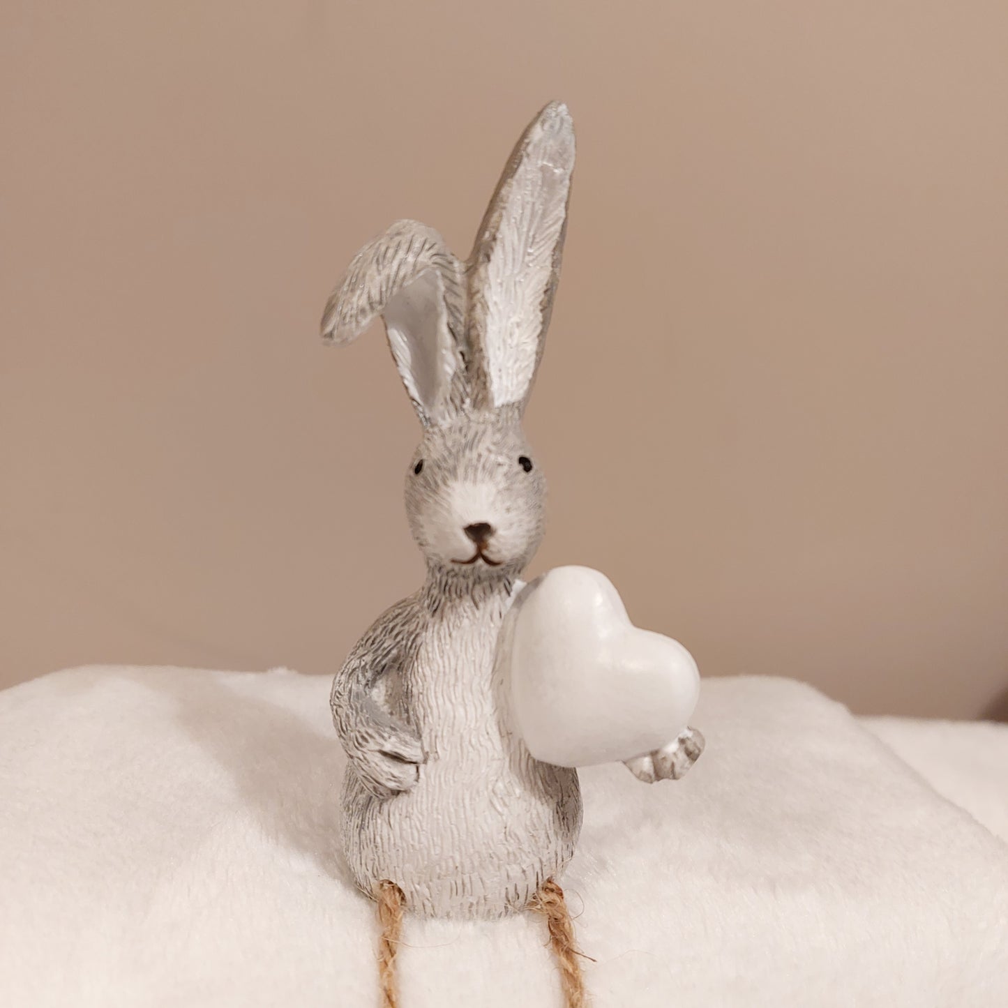 Grey Rabbit Holding a White Heart with Dangly Legs