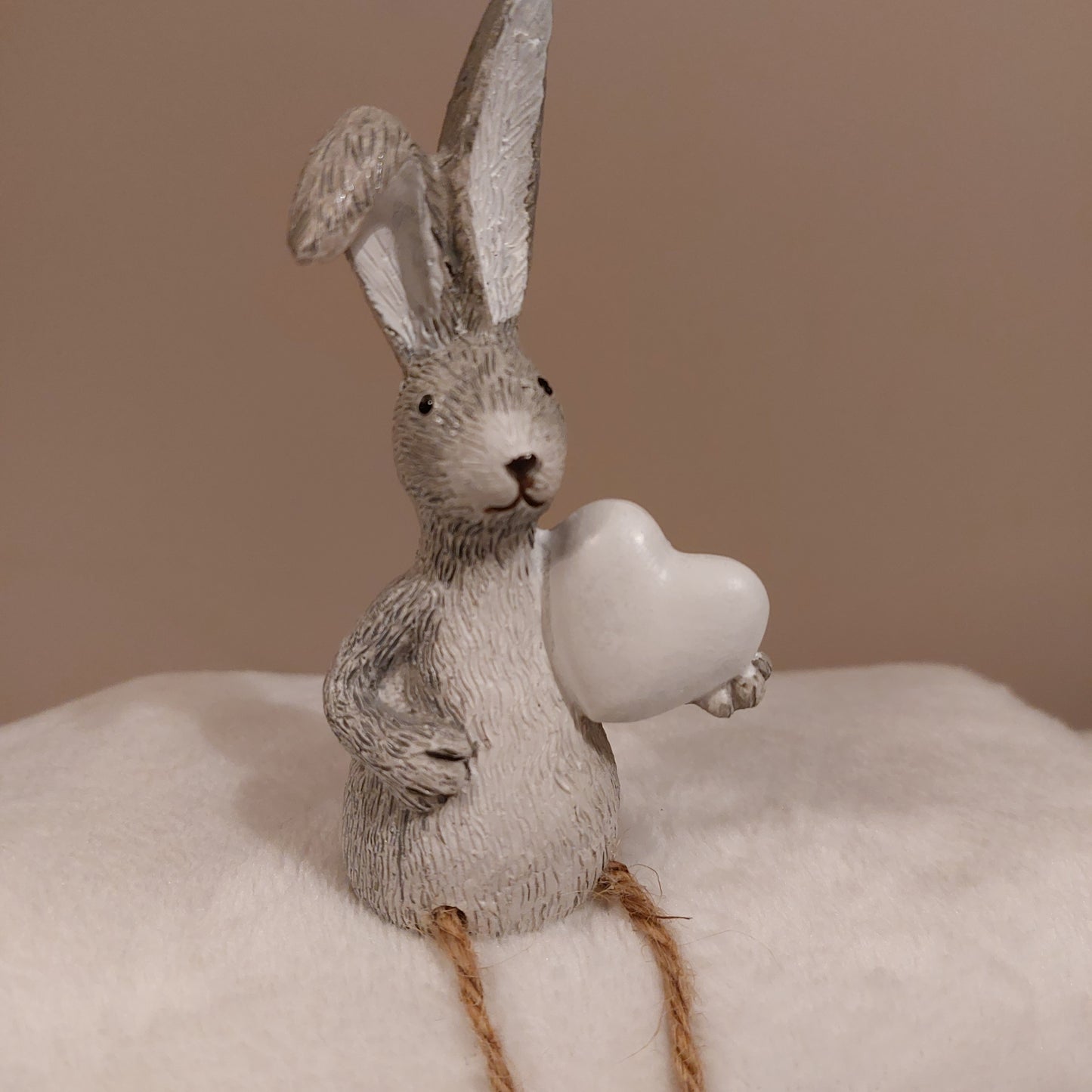 Grey Rabbit Holding a White Heart with Dangly Legs