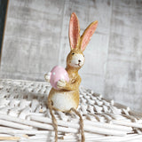 Rabbit Holding a pink egg with Dangly Legs