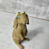 Flopsy Bunny wearing a crown of yellow flowers