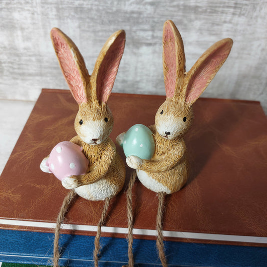 Rabbit Holding a pink egg with Dangly Legs