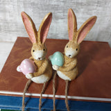 Rabbit Holding a green egg with Dangly Legs